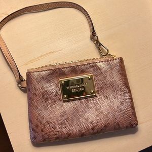 Rose gold Michael Kors wristlet